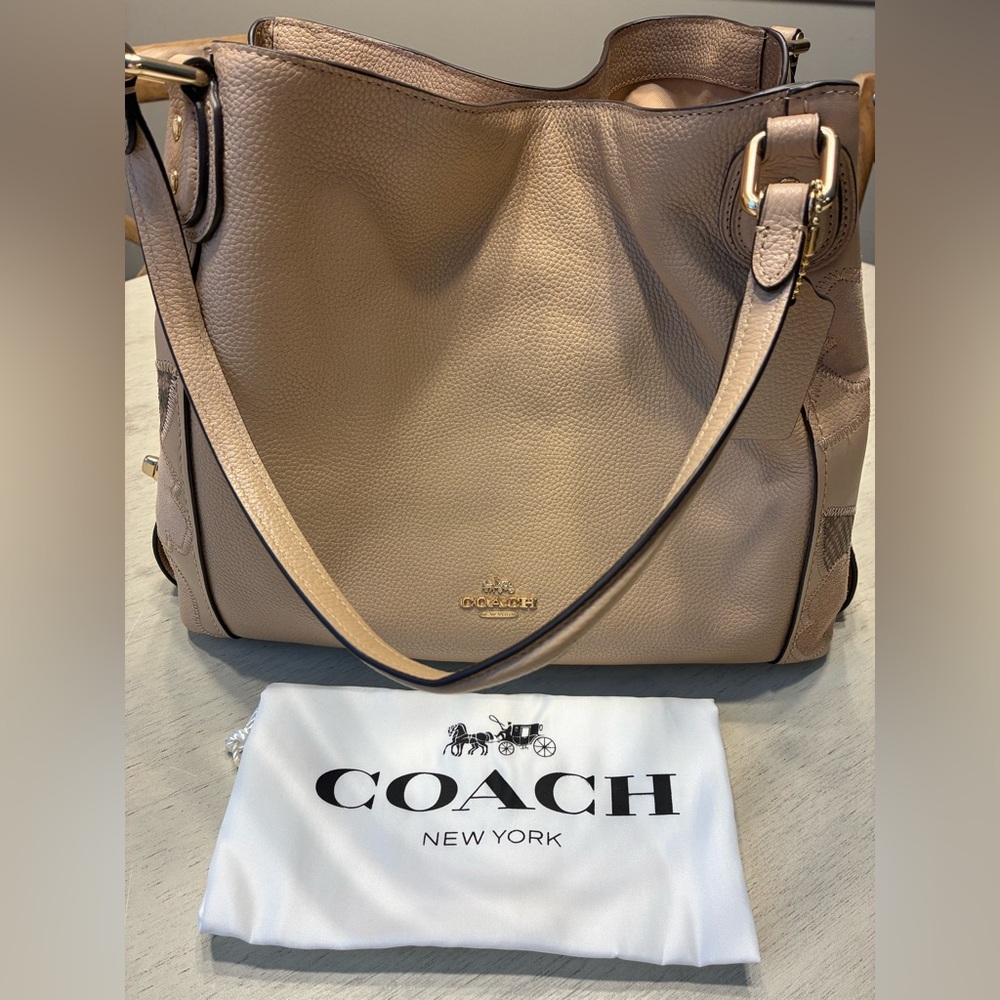 Coach Beige Leather Shoulder Bag. I would call it more of a tan and brown color.
